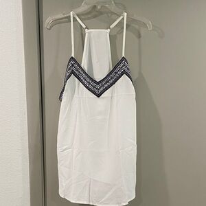 White Sleeveless Top with Black Trim
